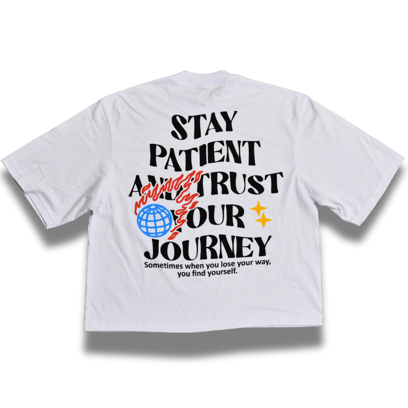 White t-shirt with motivational text and graphics on a white background