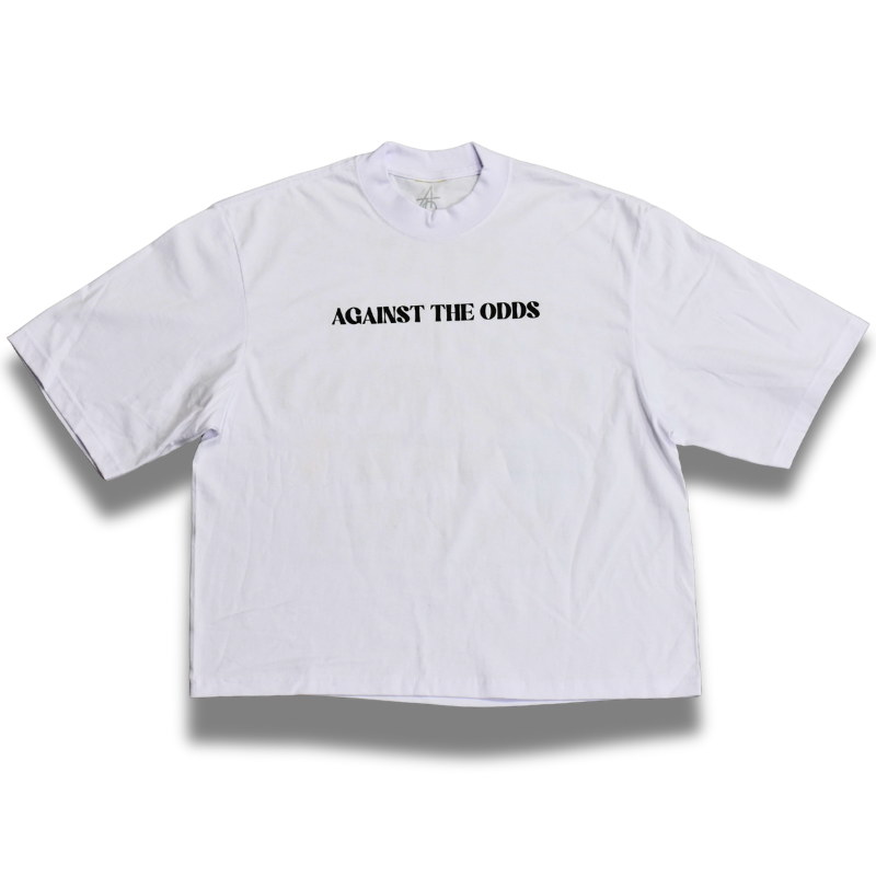 White t-shirt with 'Against the Odds' text on a white background